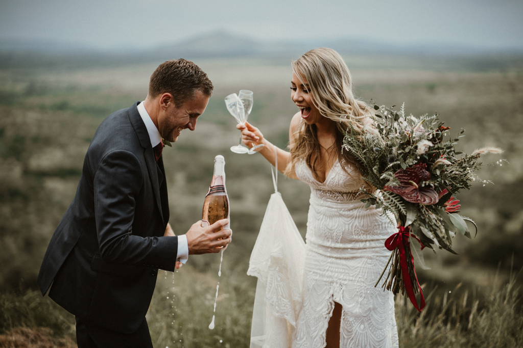 Bride and groom celebrating their wedding with champagne, photographed by Ty & Eri, Cape Town wedding photographer & videographer.